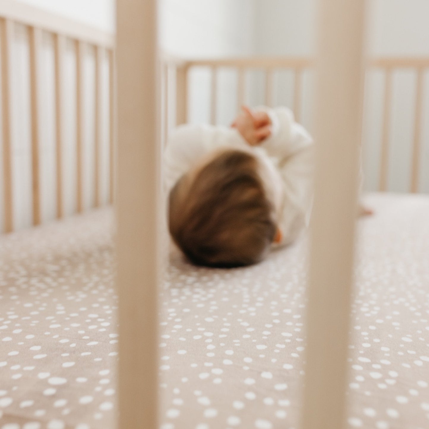 Copper Pearl premium knit fitted crib sheet in Fawn color, soft and cozy for baby cribs.
