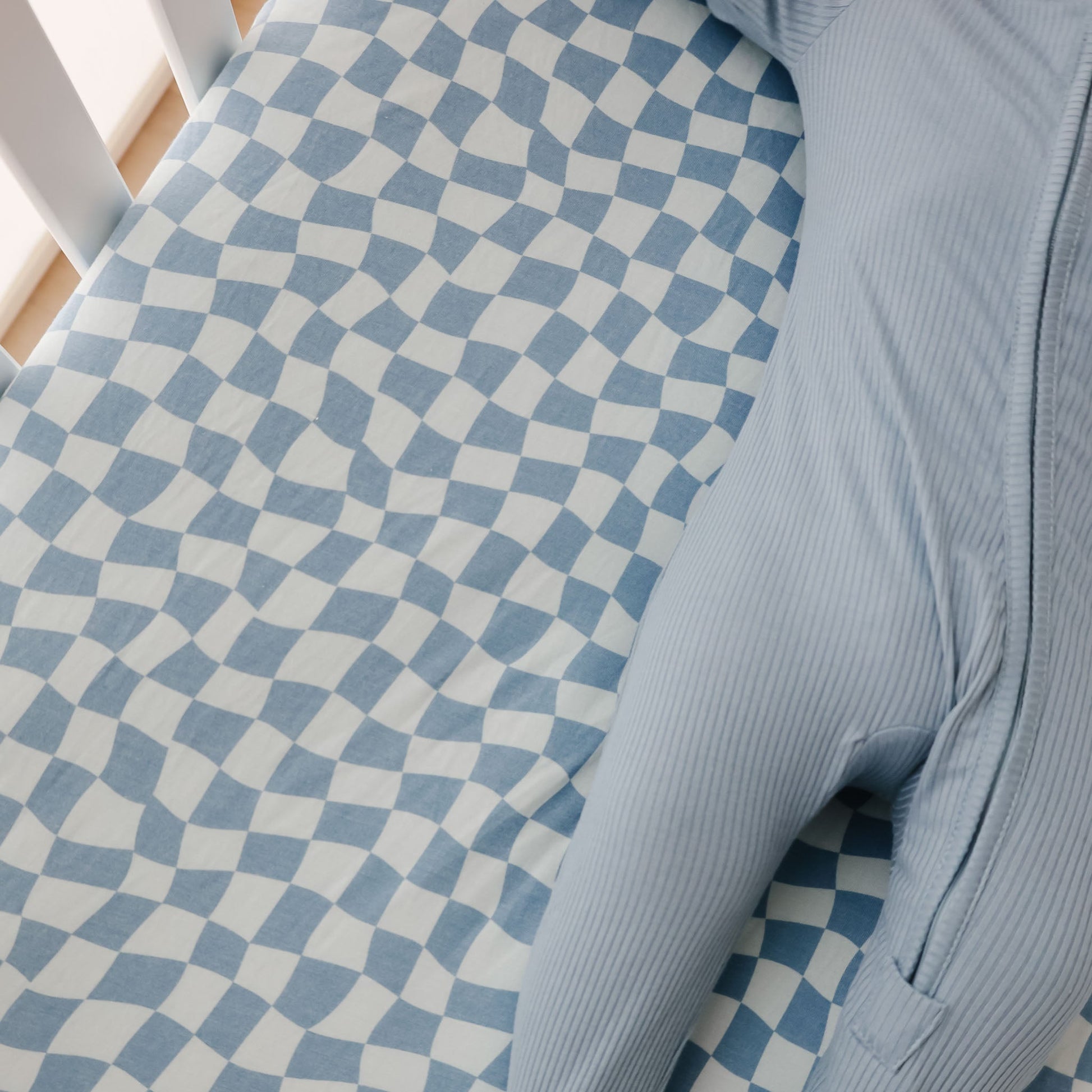Copper Pearl Premium Knit Fitted Crib Sheet in Miles pattern, soft and snug fit for baby cribs, made of cozy knit fabric.