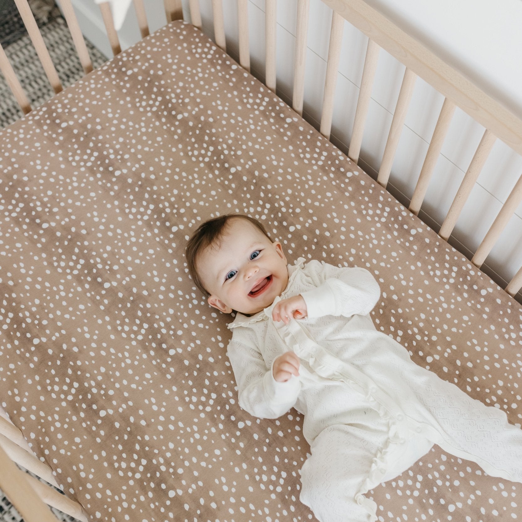 Copper Pearl premium knit fitted crib sheet in Fawn color, soft and snug for baby cribs, made by My Store.