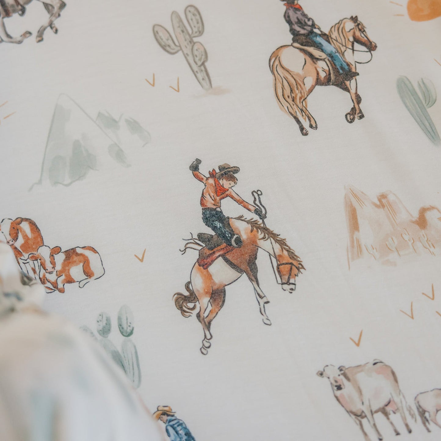 Copper Pearl Boone premium knit fitted crib sheet showing soft, cozy fabric with a subtle pattern, perfect for baby's crib bedding.