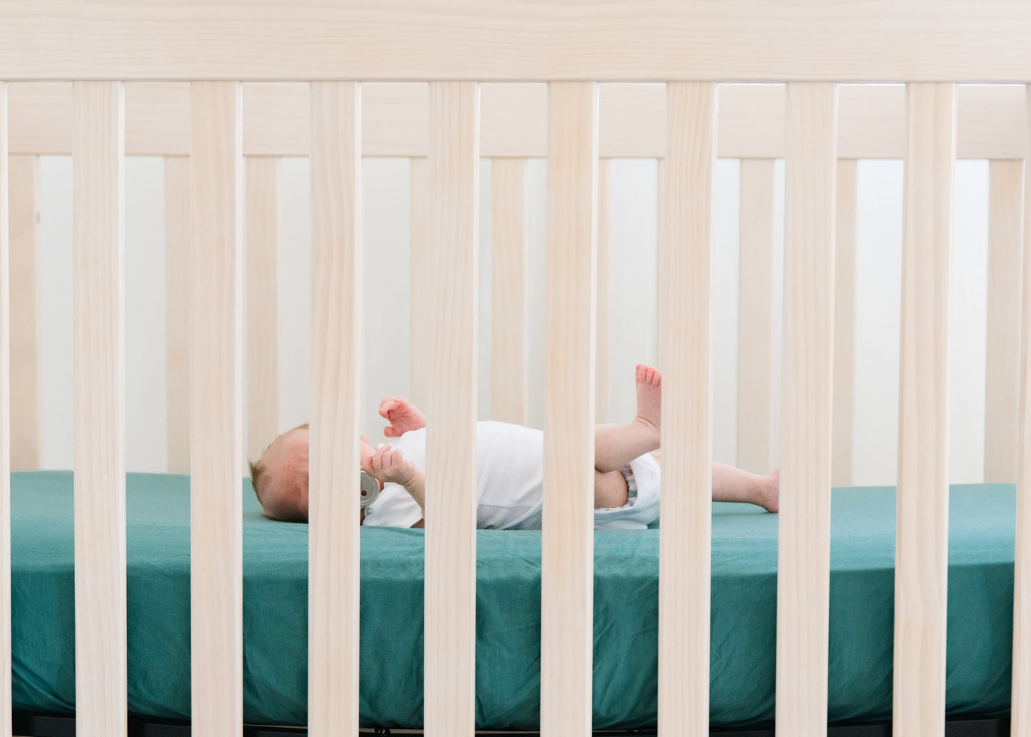 Copper Pearl Premium Knit Fitted Crib Sheet from Journey, soft and snug-fitting for baby cribs, in a cozy knit fabric.