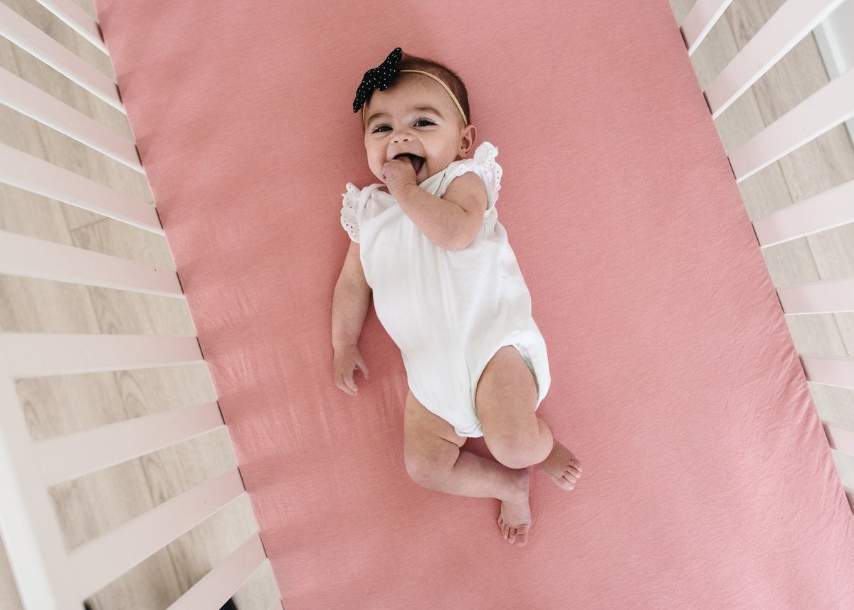 Copper Pearl Premium Knit Fitted Crib Sheet in Darling with soft, snug fit and cozy knit fabric for baby's crib.