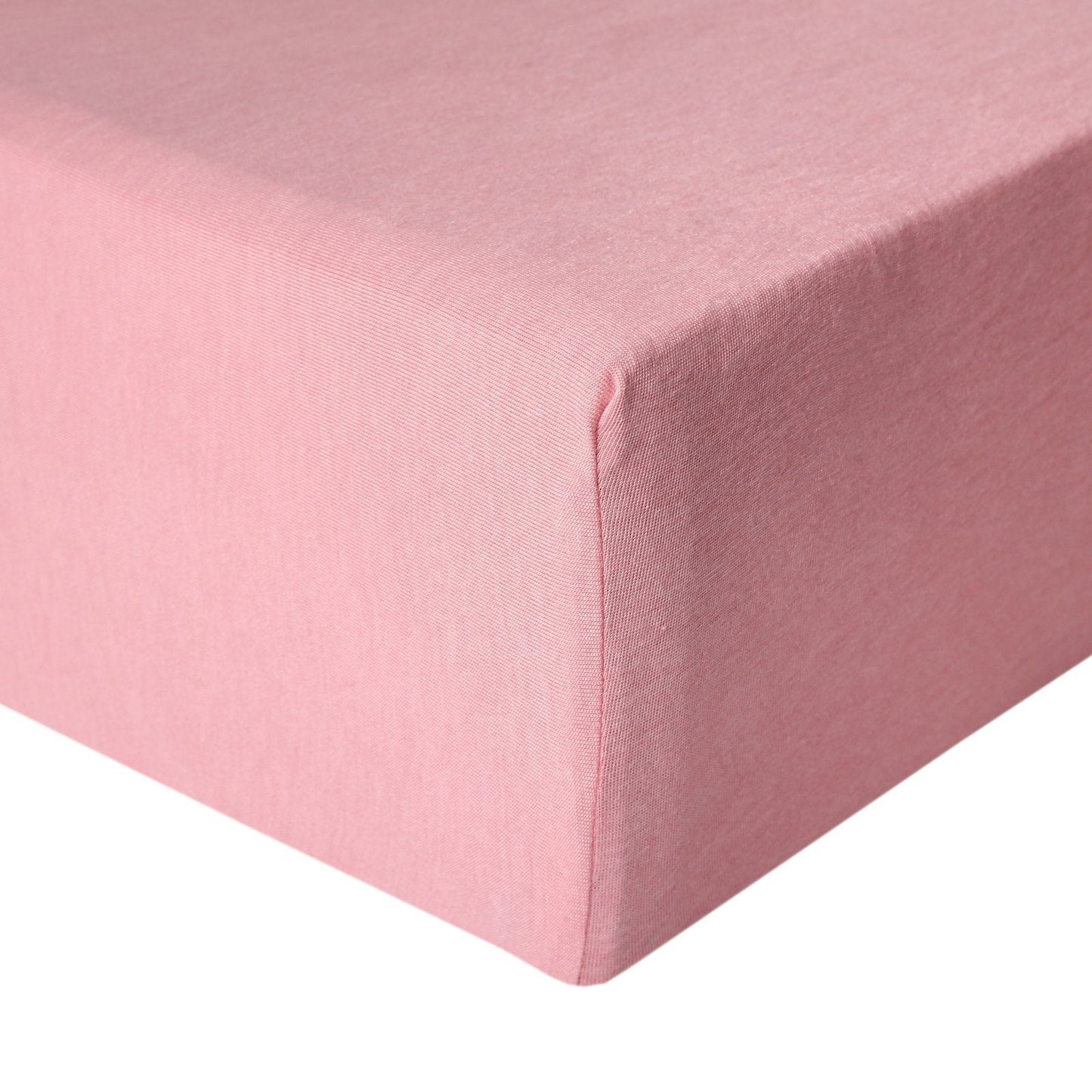 Copper Pearl premium knit fitted crib sheet in Darling color, showing soft, snug-fitting fabric on a baby crib mattress.